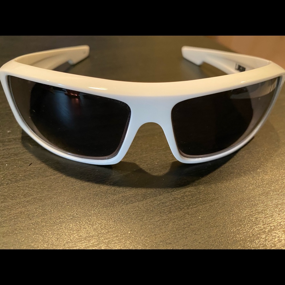 White Spy Gear sunglasses with black frames.